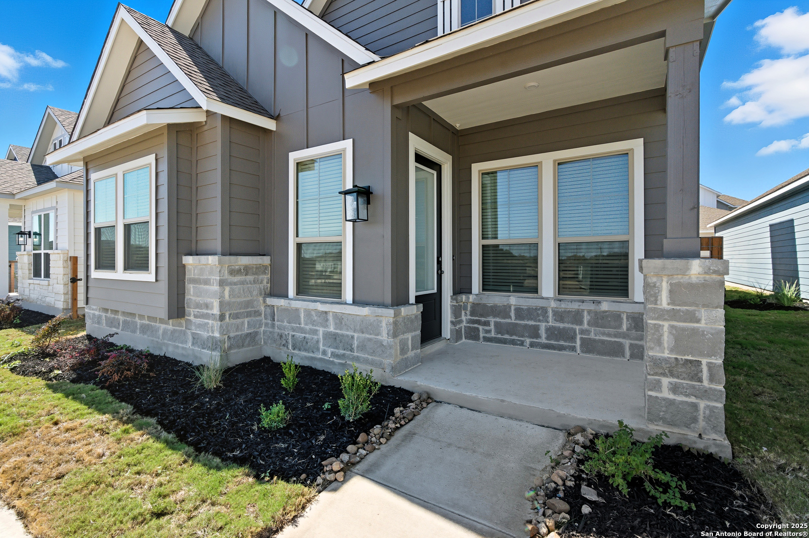9426 Chatside Schertz, TX 78154 - Photo 5 of 44 a front view of a house with a garden
