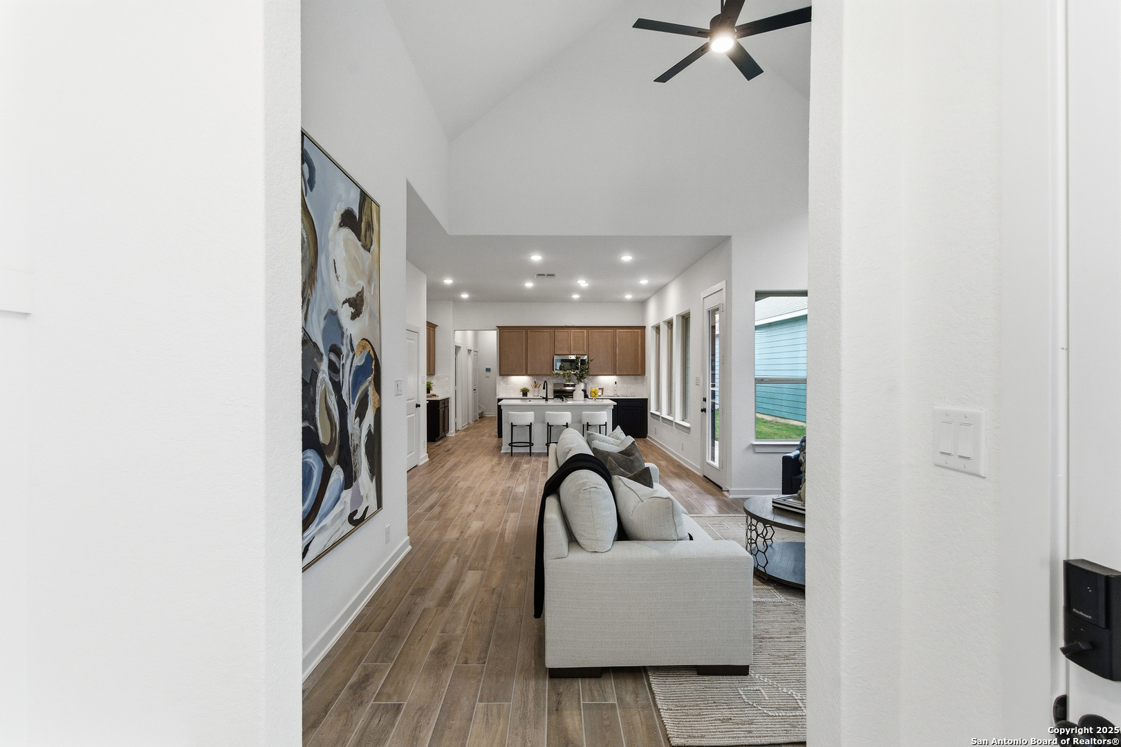9426 Chatside Schertz, TX 78154 - Photo 7 of 44 a view of a livingroom with furniture and a ceiling fan