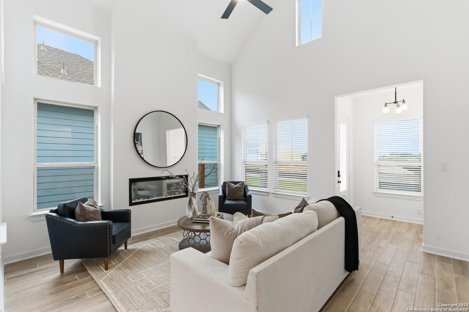 9426 Chatside Schertz, TX 78154 - Photo 10 of 44 a living room with furniture a mirror and a window