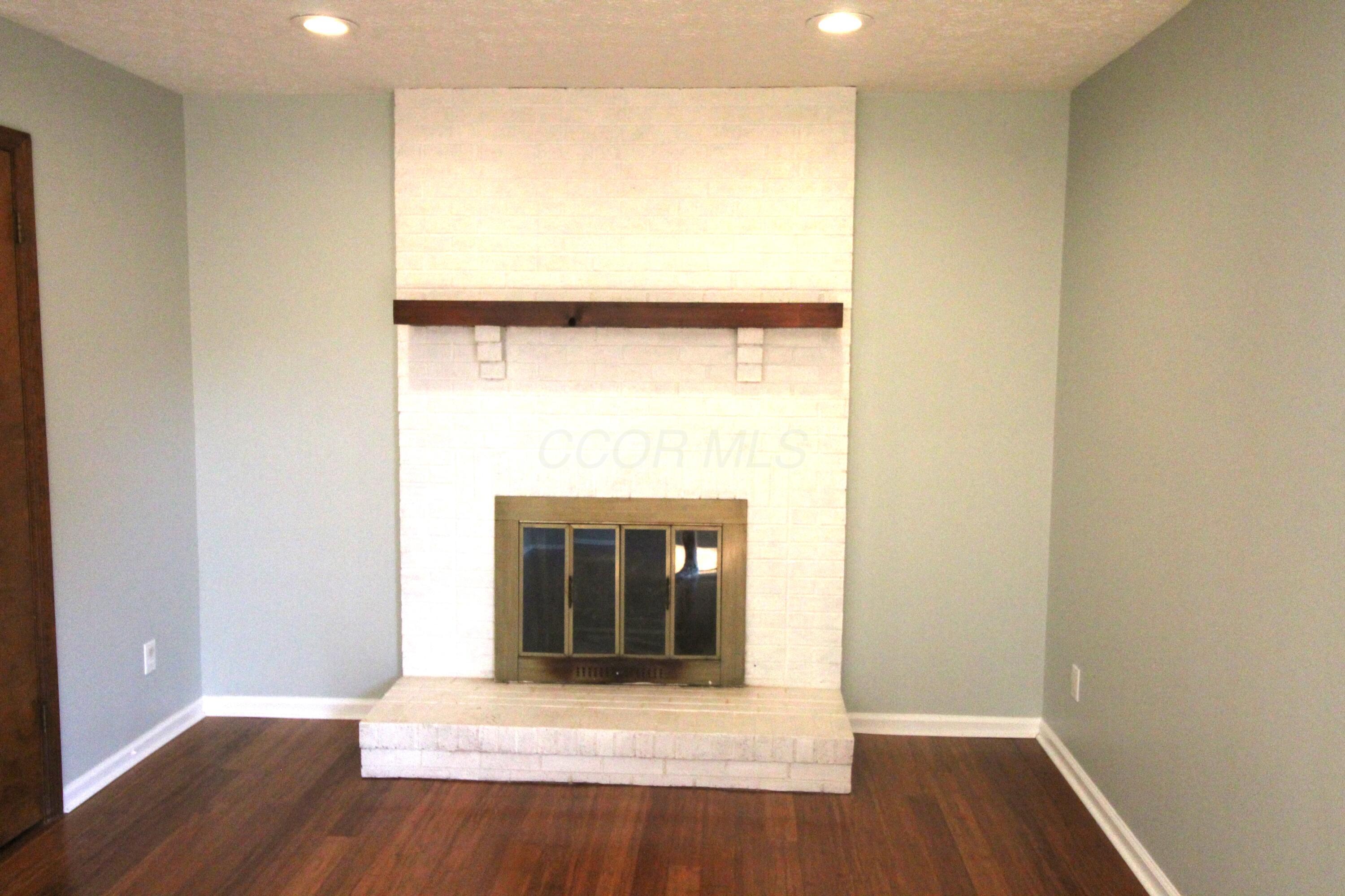 1800 Quarry Ridge Drive Columbus, OH 43232 - Photo 7 of 19 With decorative fireplace