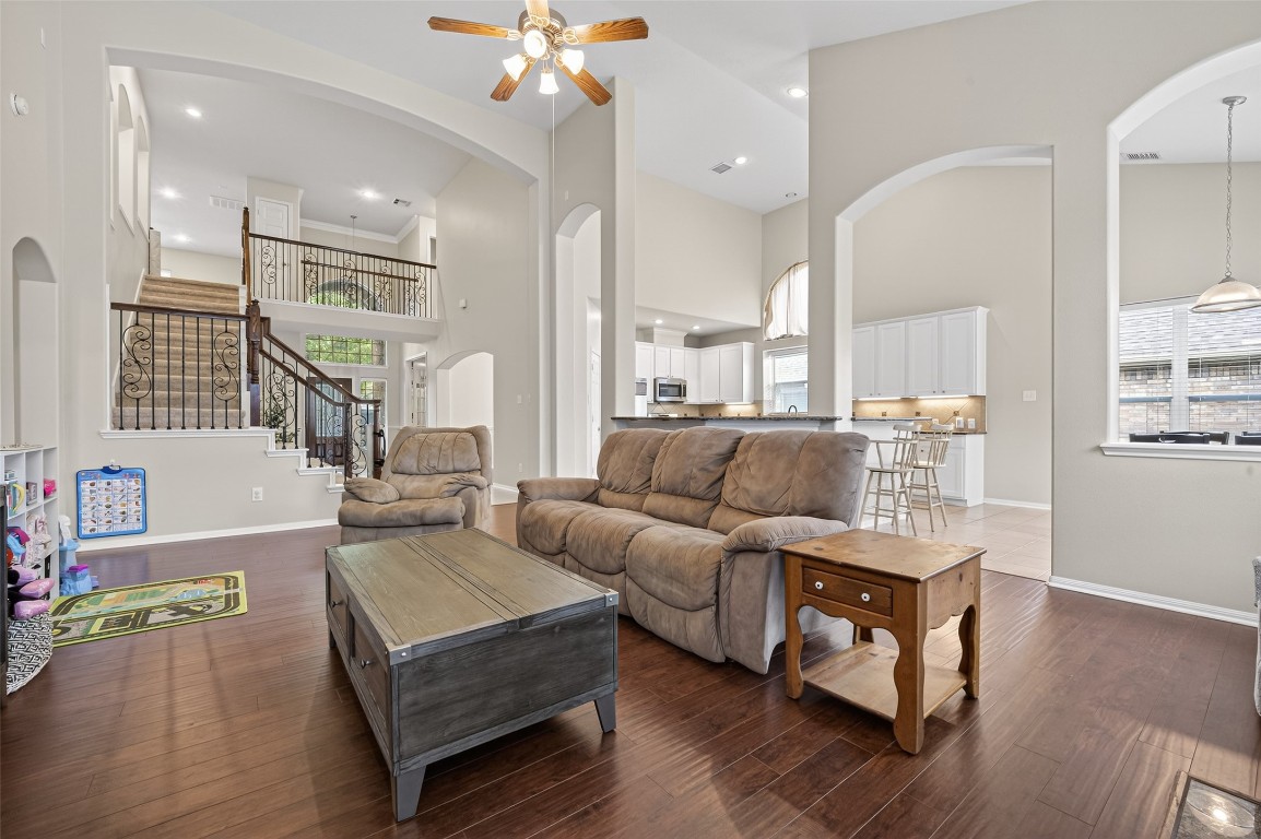 3219 Legends Mist Drive Spring, TX 77386 - Photo 11 of 50 a living room with furniture and wooden floor