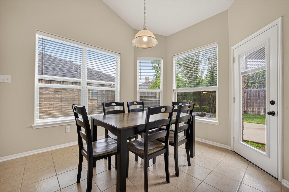 3219 Legends Mist Drive Spring, TX 77386 - Photo 14 of 50 a view of a dining room with furniture window and outside view