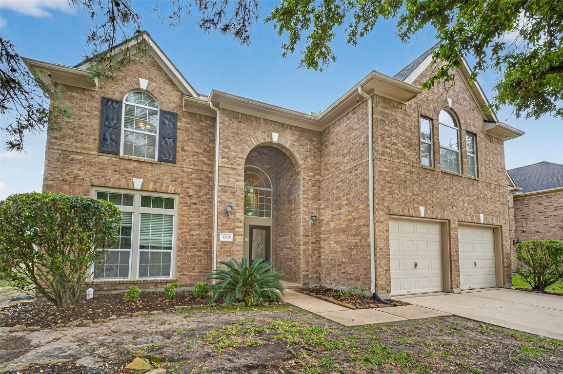 3219 Legends Mist Drive Spring, TX 77386 - Photo 2 of 50 a front view of a house