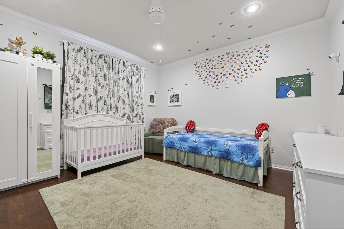 3219 Legends Mist Drive Spring, TX 77386 - Photo 24 of 50 a bedroom with a bed and a window