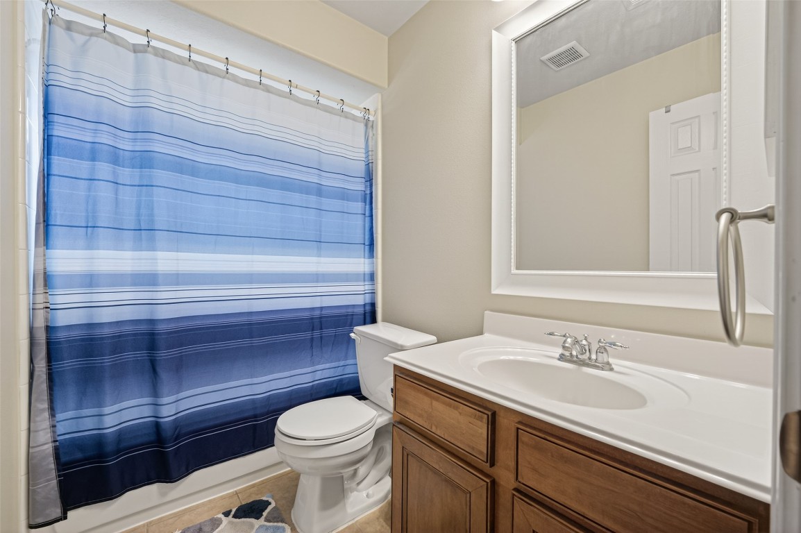 3219 Legends Mist Drive Spring, TX 77386 - Photo 38 of 50 a bathroom with a sink a toilet and shower