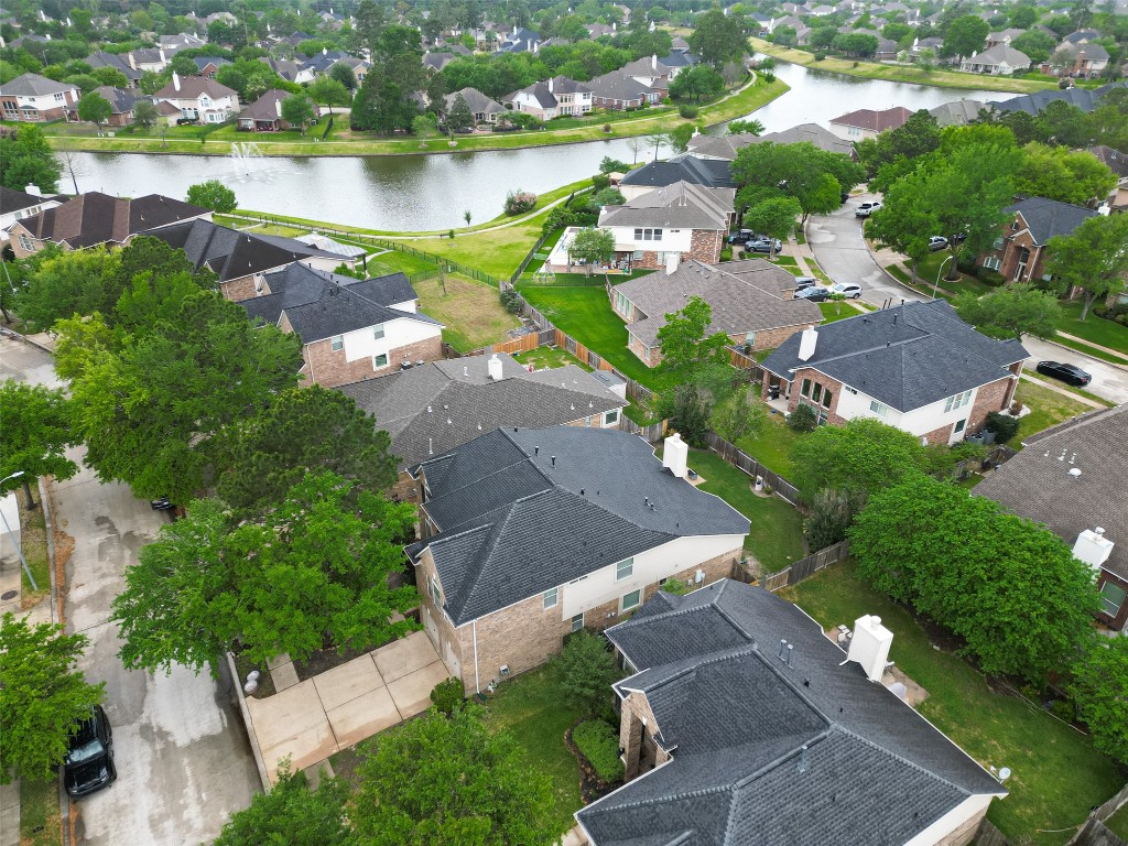 3219 Legends Mist Drive Spring, TX 77386 - Photo 48 of 50 an aerial view of a house with a lake view