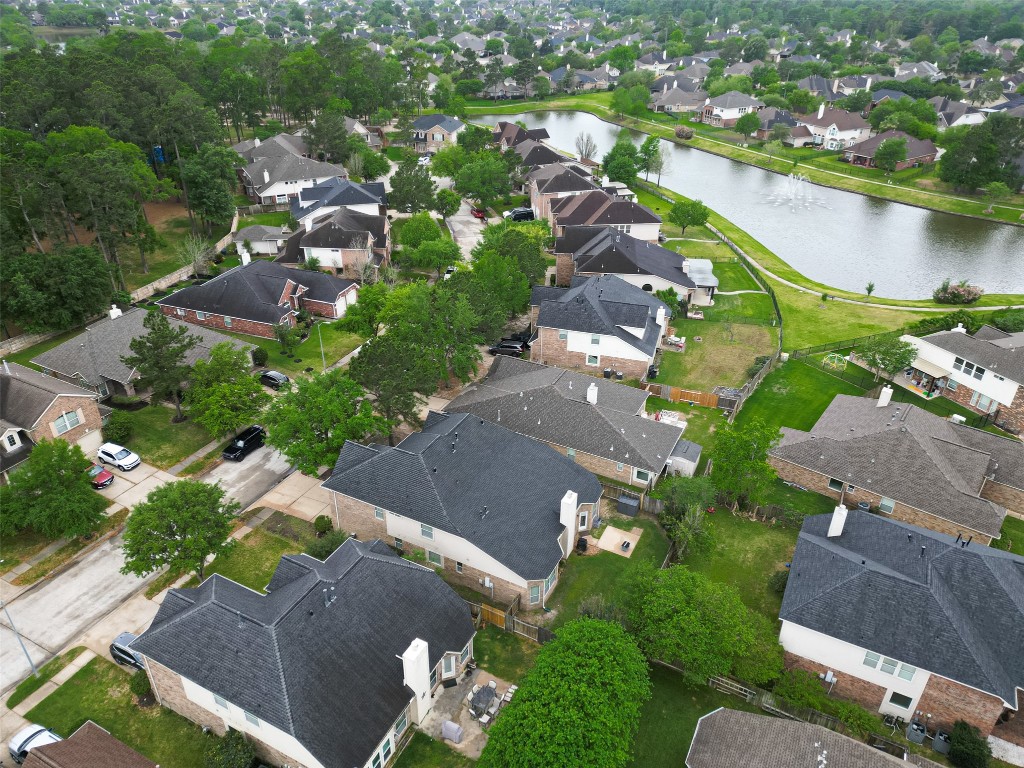 3219 Legends Mist Drive Spring, TX 77386 - Photo 49 of 50 an aerial view of a city with lake view