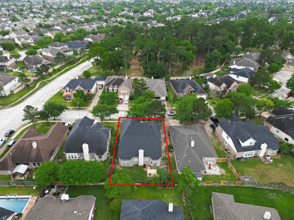 3219 Legends Mist Drive Spring, TX 77386 - Photo 50 of 50 an aerial view of residential houses with outdoor space and trees