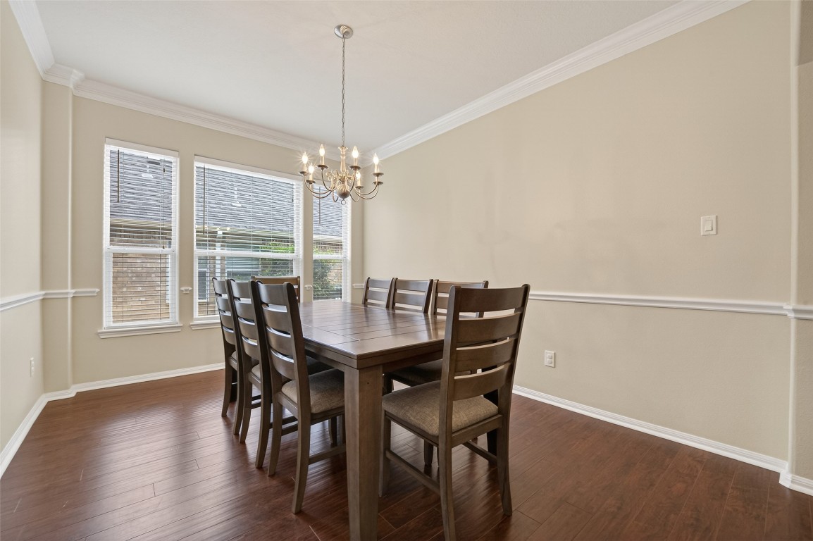 3219 Legends Mist Drive Spring, TX 77386 - Photo 7 of 50 a view of a dining room with furniture window and wooden floor