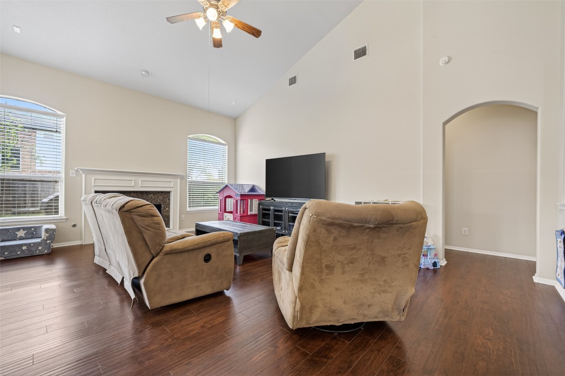 3219 Legends Mist Drive Spring, TX 77386 - Photo 8 of 50 a living room with furniture and a flat screen tv
