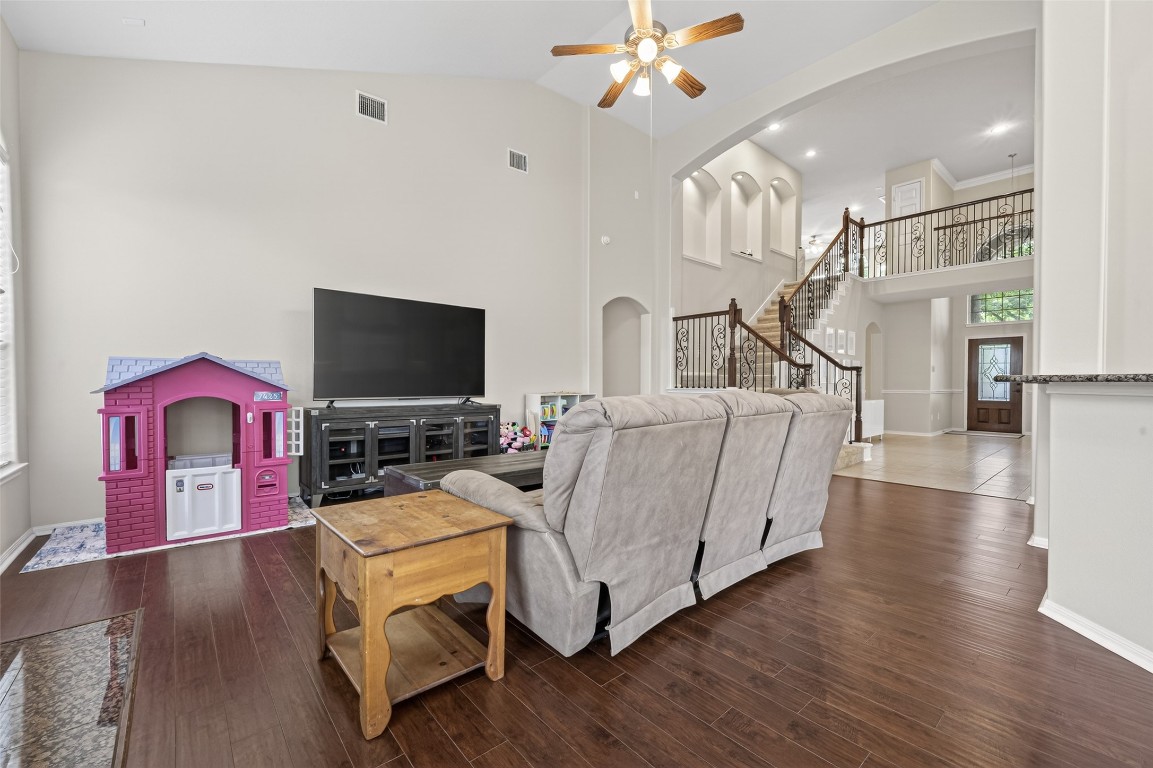 3219 Legends Mist Drive Spring, TX 77386 - Photo 10 of 50 a living room with furniture and a flat screen tv