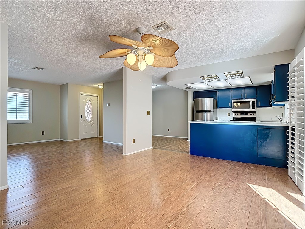 5946 Stringfellow Road St. James City, FL 33956 - Photo 24 of 50 a view of kitchen and window