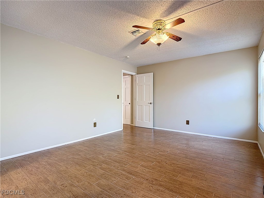 5946 Stringfellow Road St. James City, FL 33956 - Photo 26 of 50 a view of an empty room