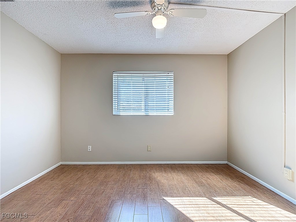 5946 Stringfellow Road St. James City, FL 33956 - Photo 33 of 50 an empty room with a window