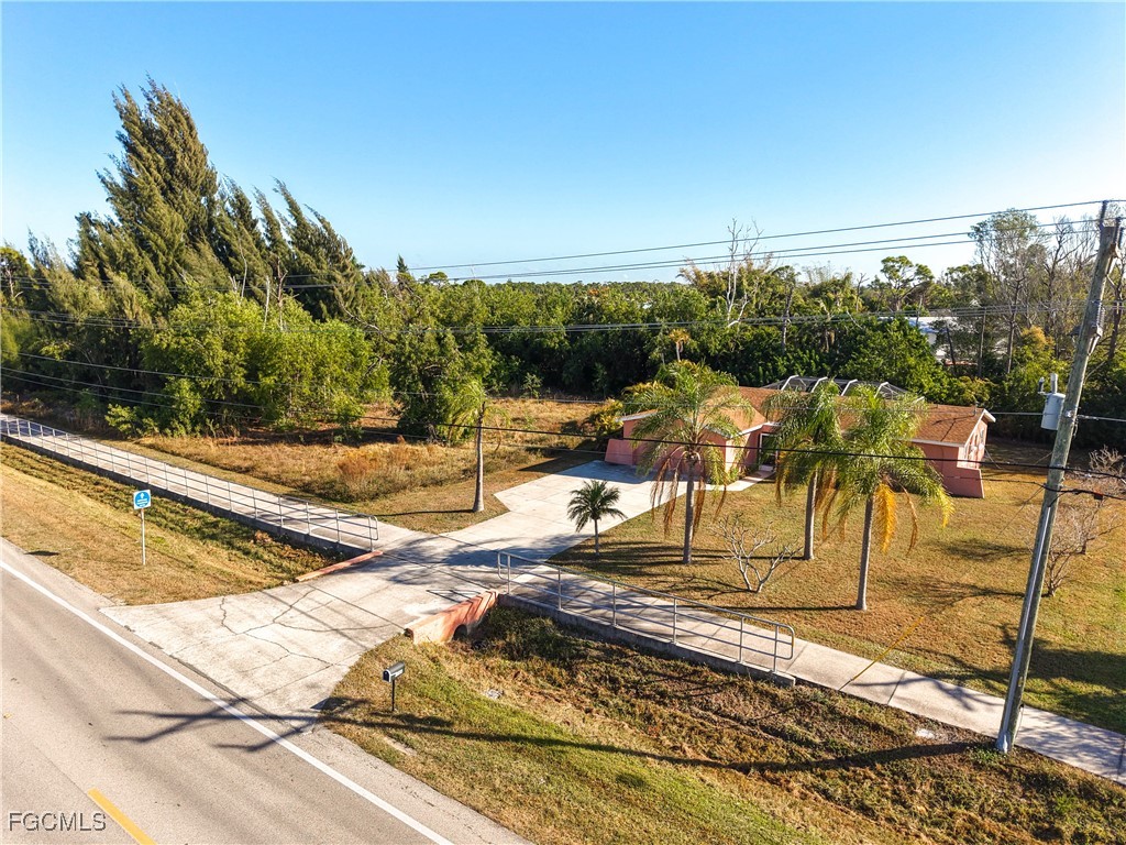 5946 Stringfellow Road St. James City, FL 33956 - Photo 5 of 50 a view of a swimming pool with a patio