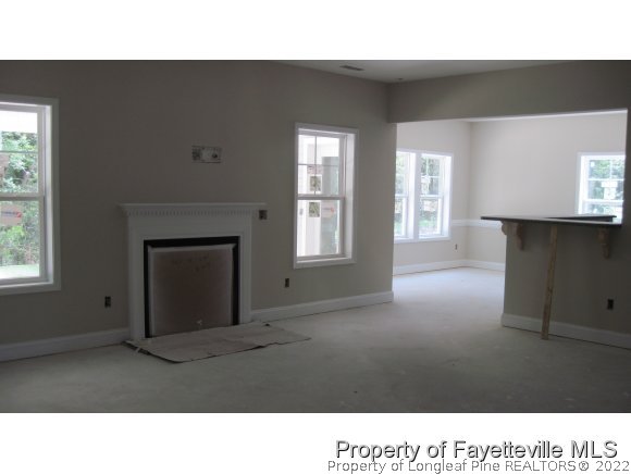 775 Sun Road Aberdeen, NC 28315 - Photo 6 of 17 a black and white photo of a living room
