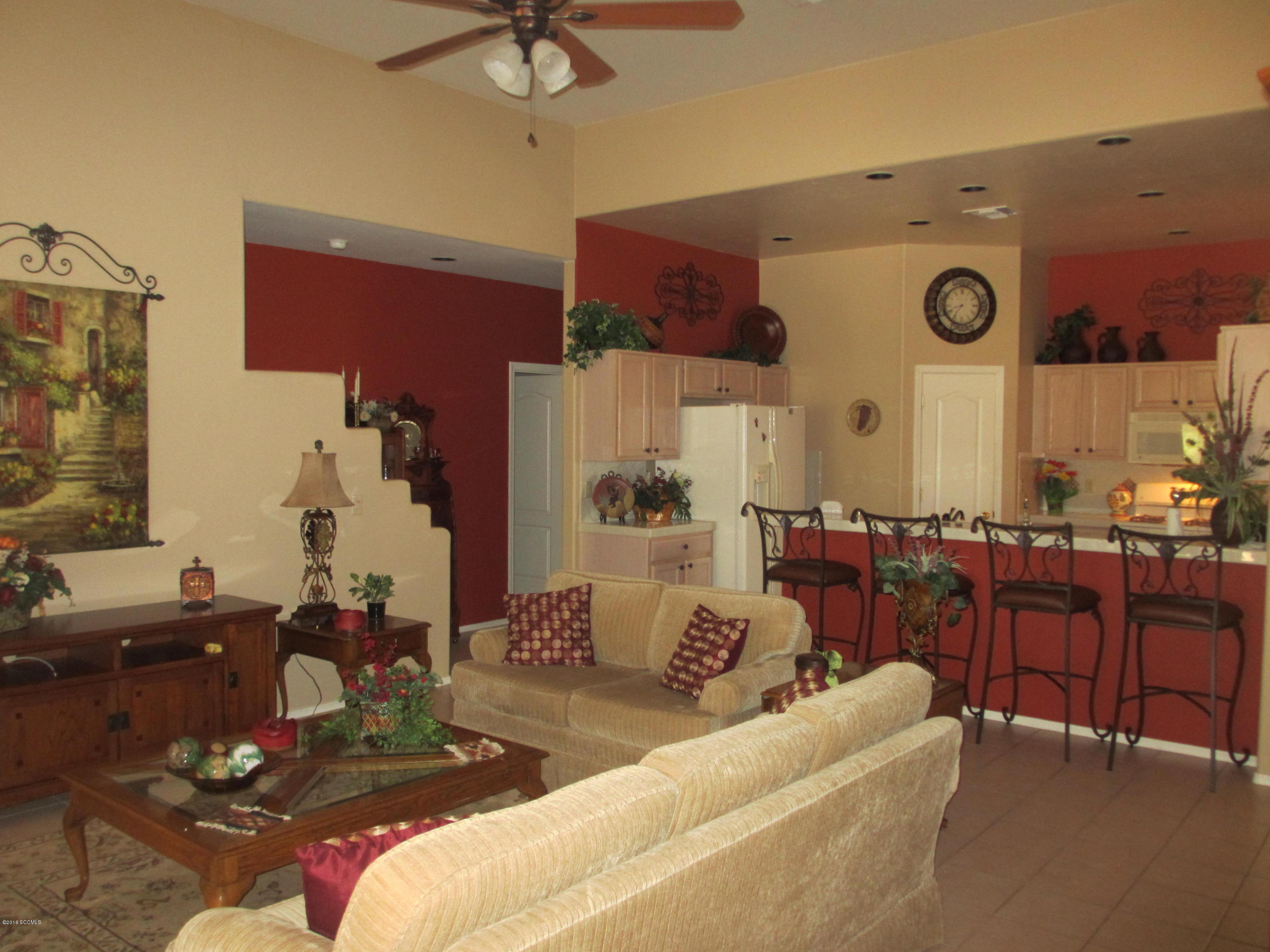 353 Via Bella Donna Rio Rico, AZ 85648 - Photo 4 of 44 a living room with furniture and a large window