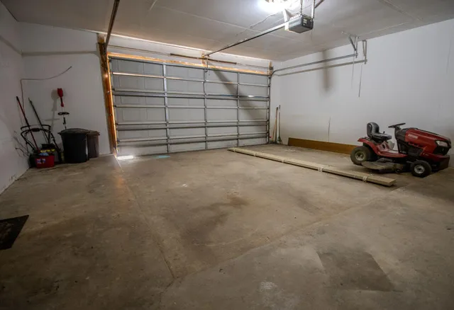a view of a garage with storage