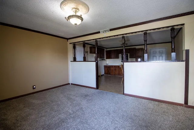 a view of a livingroom with furniture