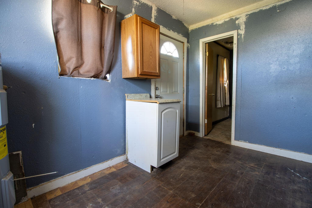 2609 County Road 7110 Lubbock, TX 79404 - Photo 23 of 29 a view of a storage and utility room with closet
