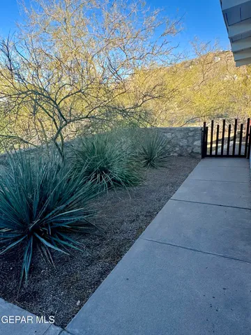 a view of a hallway with a window