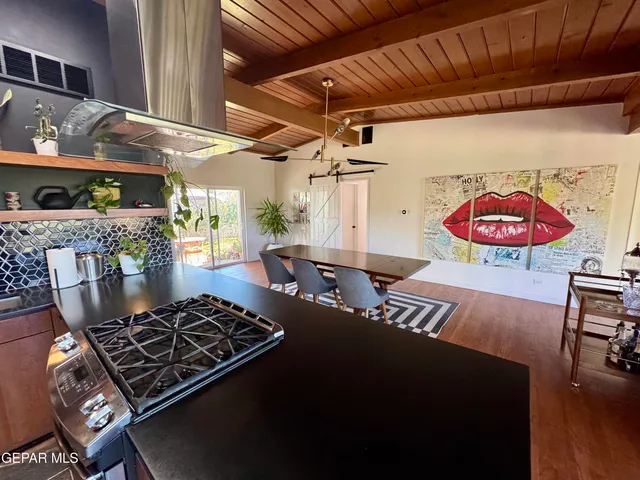 a living room with hard wood floor