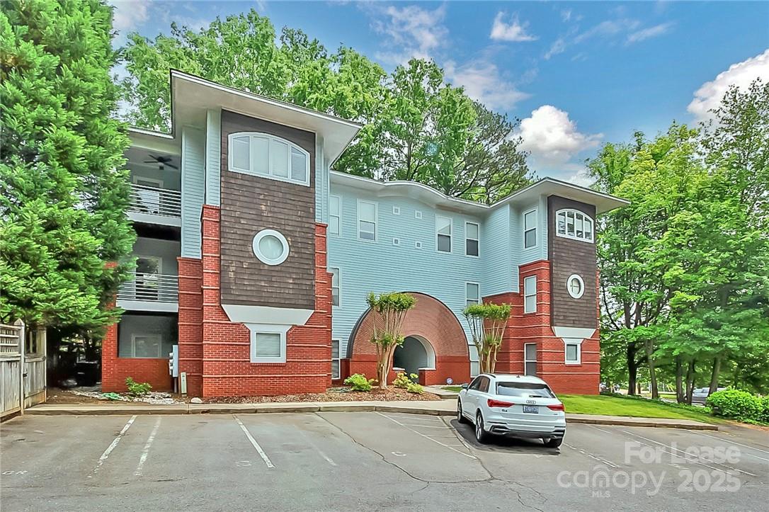2625 East 5th Street, Unit A Charlotte, NC 28204 - Photo 2 of 24 a building view with a outdoor space