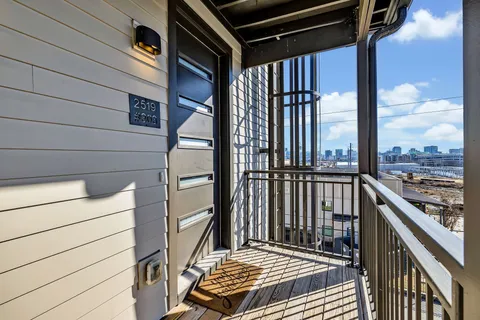 a view of balcony and wooden floor