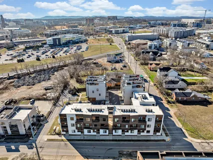 an aerial view of a building with outdoor space