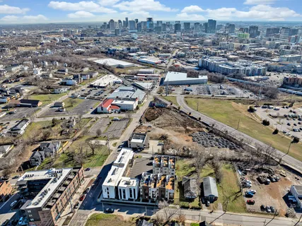 an aerial view of residential building and lake view