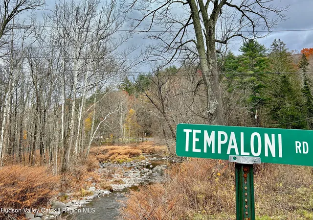a street sign that is on a pole