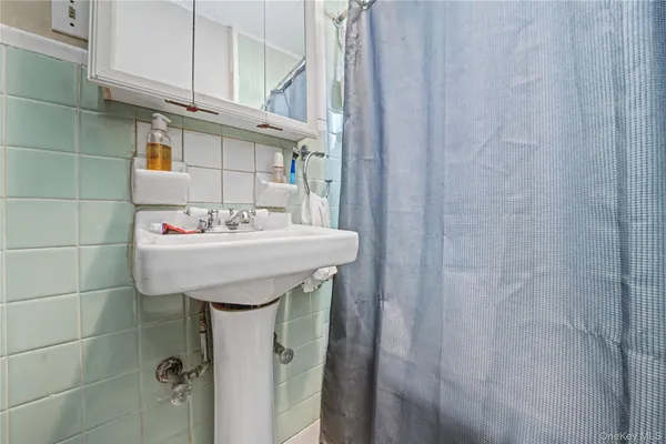 a sink with a mirror