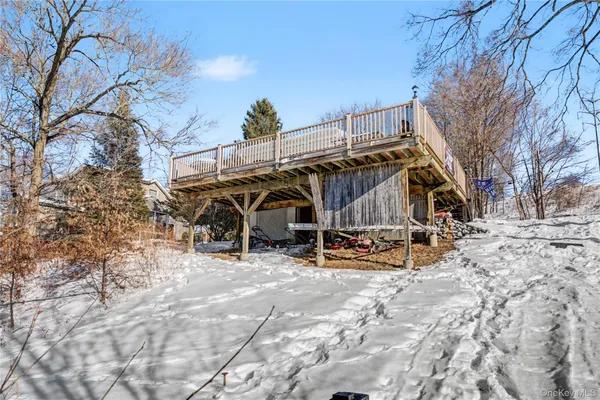a view of outdoor space with wooden fence