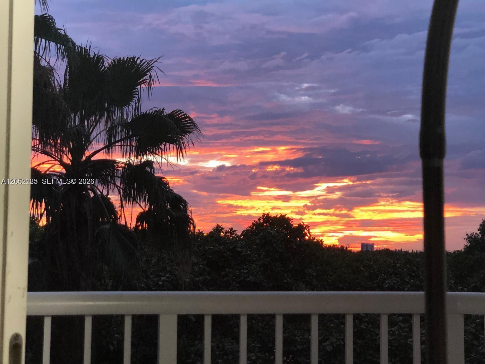 280 Southwest 20th Road, Unit 504 Miami, FL 33129 - Photo 36 of 36 Sunset View from Balcony