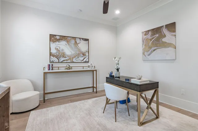 a view of a workspace with furniture