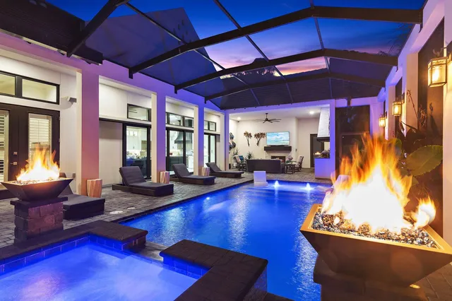 a room with furniture and large pool table