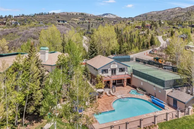 an aerial view of a house with a garden