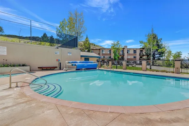 a front view of house with yard and outdoor seating