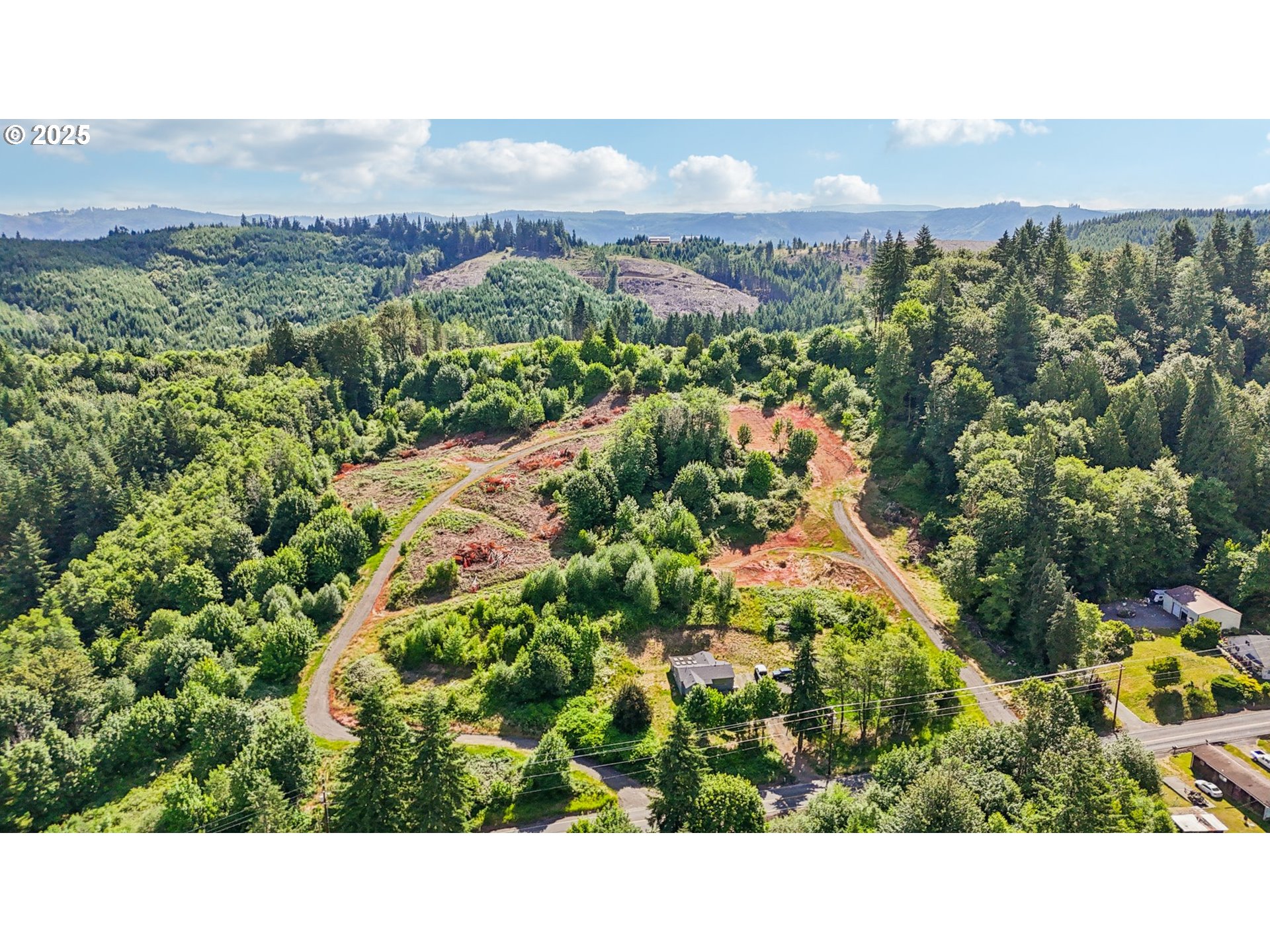 1830 Hazel Dell Road, Unit LOT 3 Castle Rock, WA 98611 - Photo 11 of 31 a view of a city