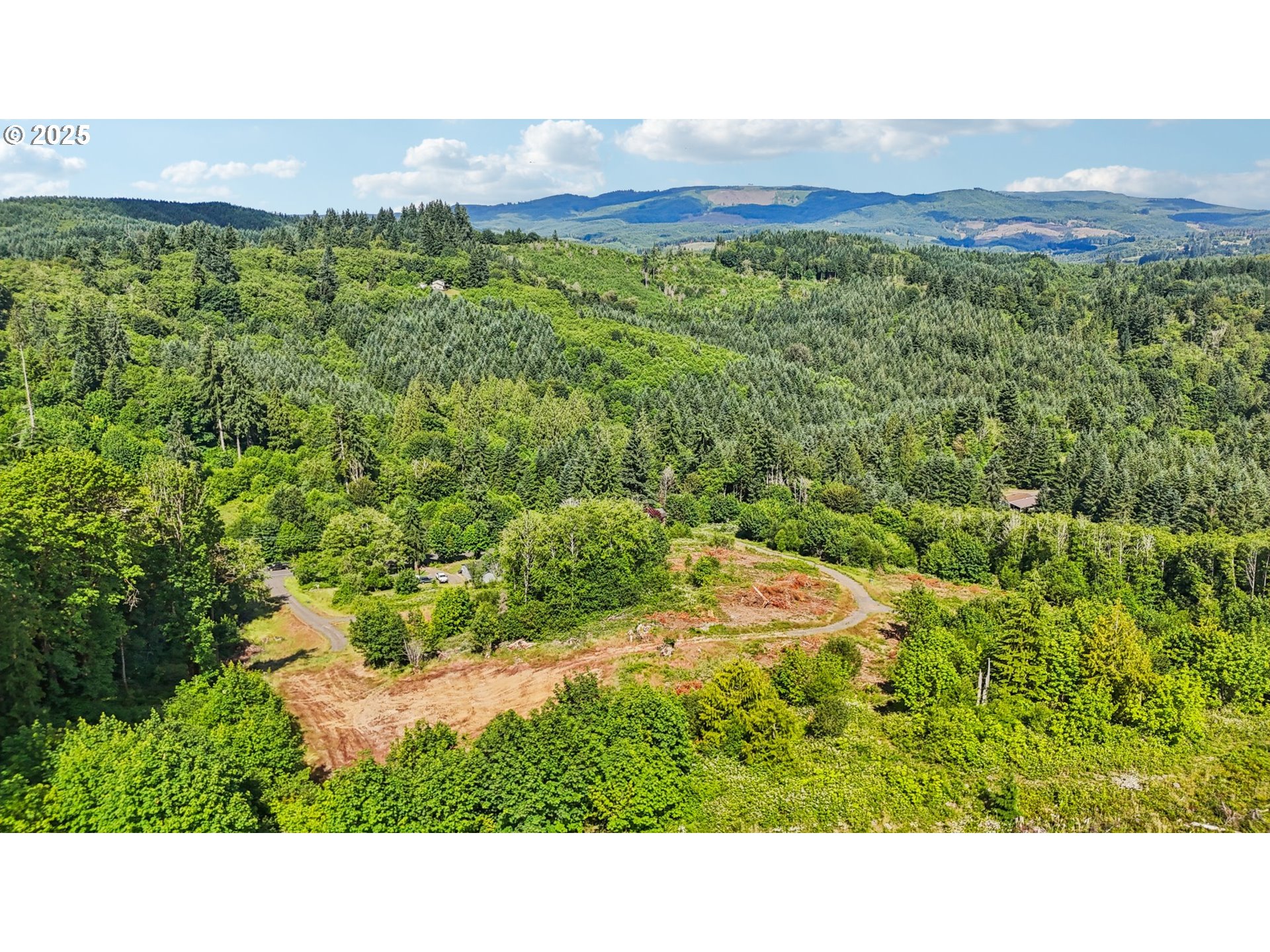 1830 Hazel Dell Road, Unit LOT 3 Castle Rock, WA 98611 - Photo 18 of 31 a black and white photo of a building
