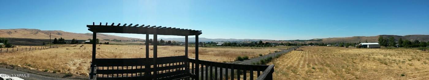 340 West Huntzinger Road Selah, WA 98942 - Photo 74 of 74 a terrace with outdoor seating and lake view