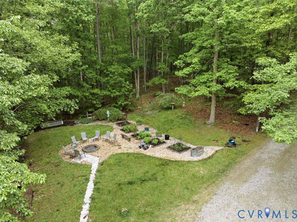 1061 Turkey Ridge Drive Moseley, VA 23120 - Photo 45 of 51 a view of a garden with patio
