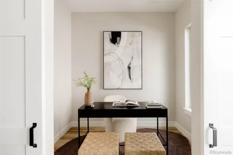 a room with a table and a potted plant