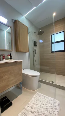 a bathroom with a bathtub sink and toilet