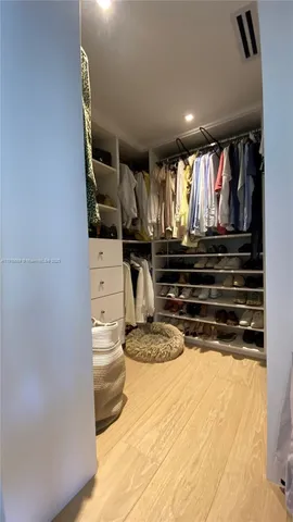 a kitchen with a stove and a refrigerator