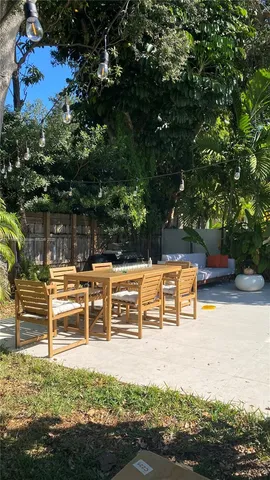 a view of a lake with sitting area