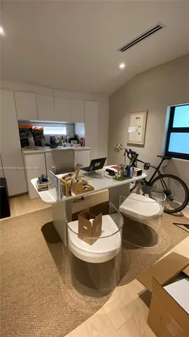 a kitchen with a sink and a stove top oven