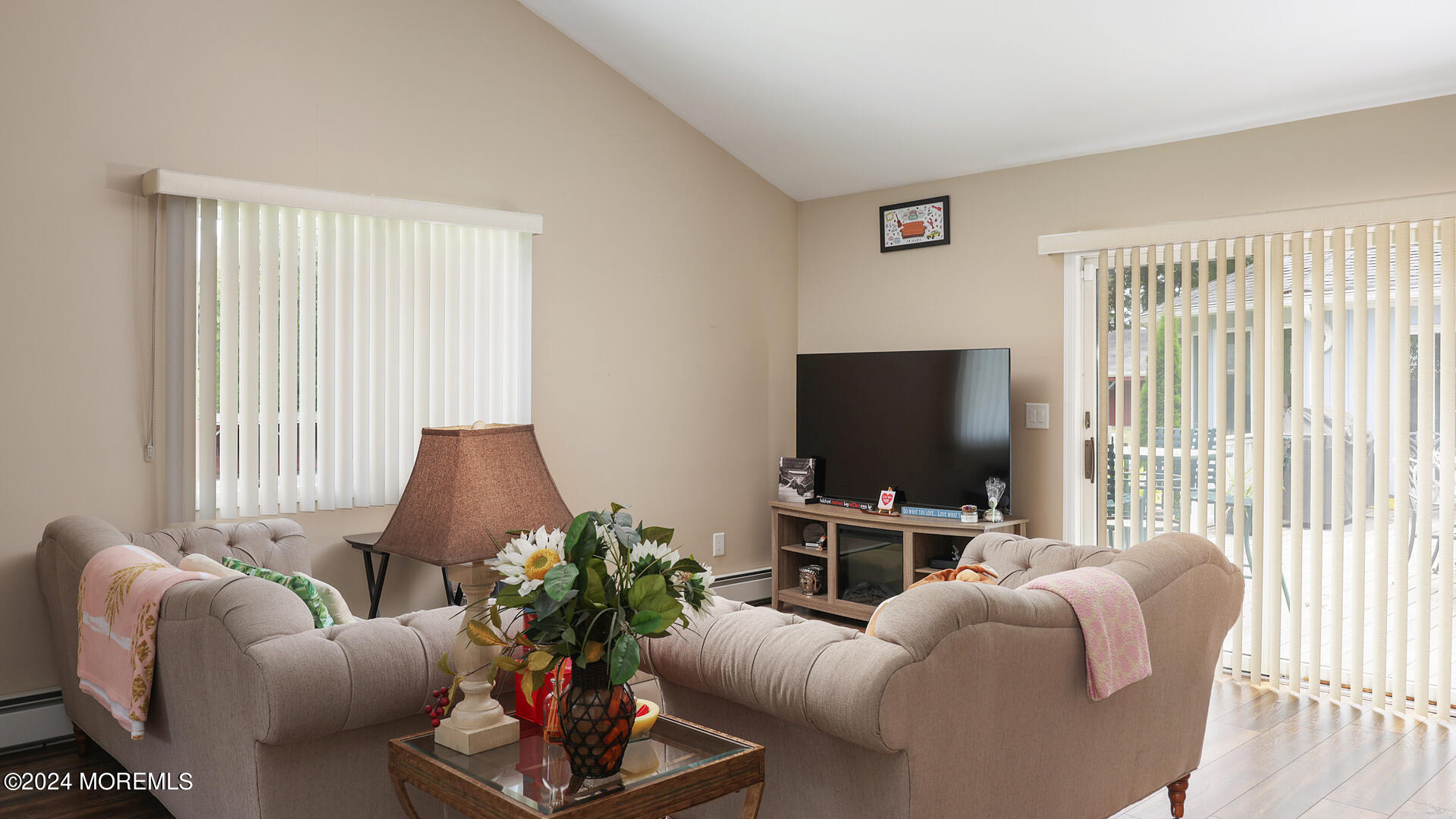 191 Victory Road Howell, NJ 07731 - Photo 16 of 54 a living room with furniture and a flat screen tv