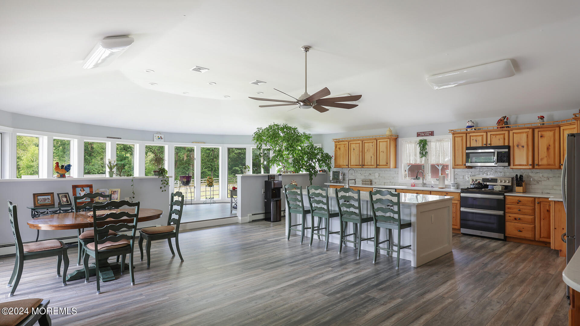 191 Victory Road Howell, NJ 07731 - Photo 5 of 54 a view of a dining room with furniture window and wooden floor