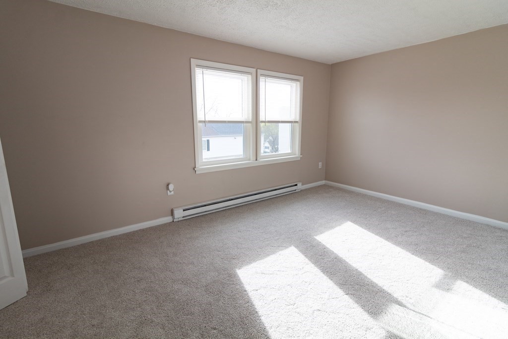 20 Rice Lane, Unit 2 Worcester, MA 01604 - Photo 11 of 17 an empty room with a window